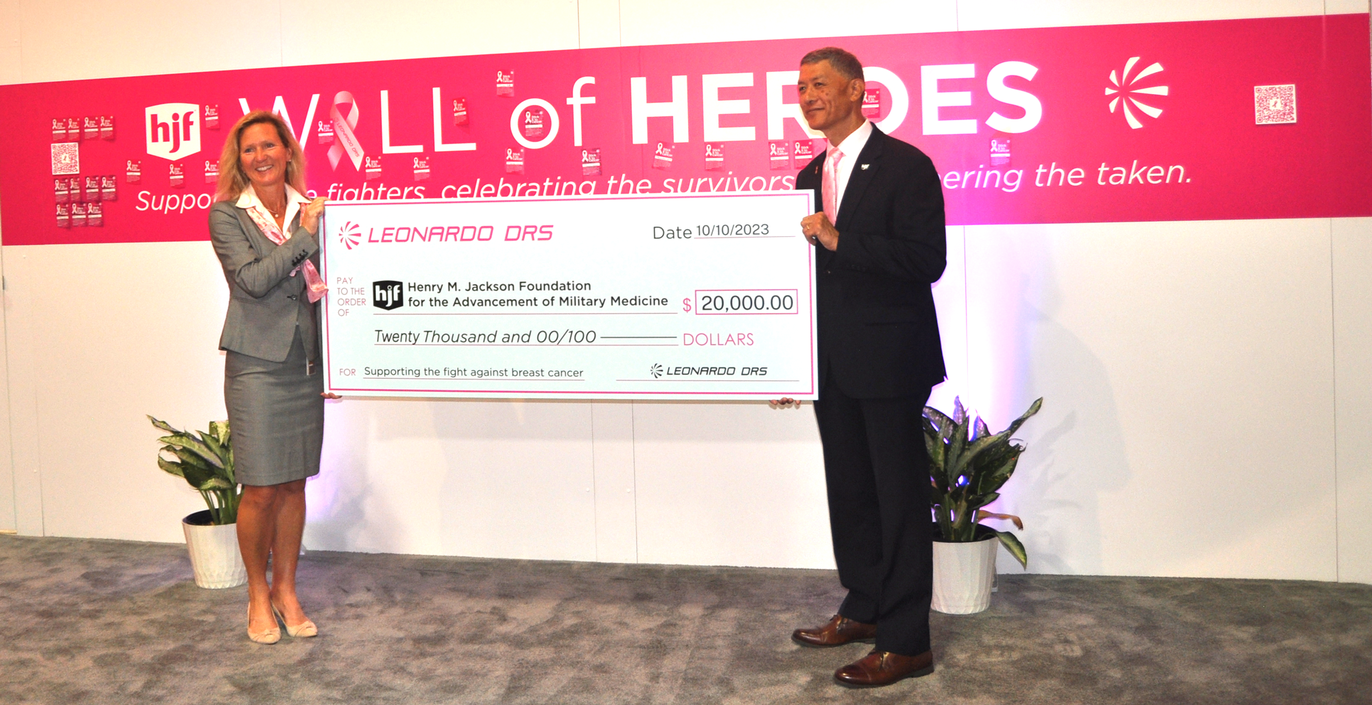 Leonardo DRS presenting HJF with donation check 2023