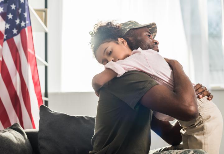 Hugging Military Father and Child